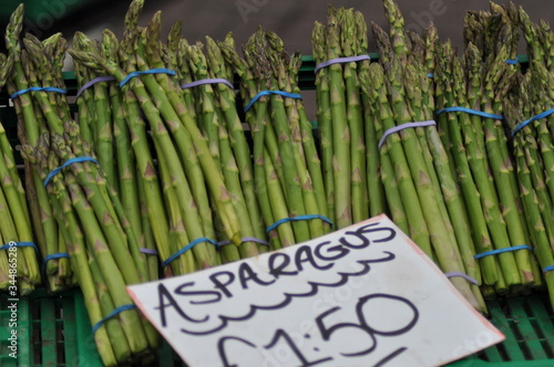 Bunches of asparagus for sale at a farmers market for   1.50.