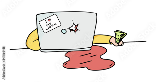 Freelance developer looking at the laptop and paper document.