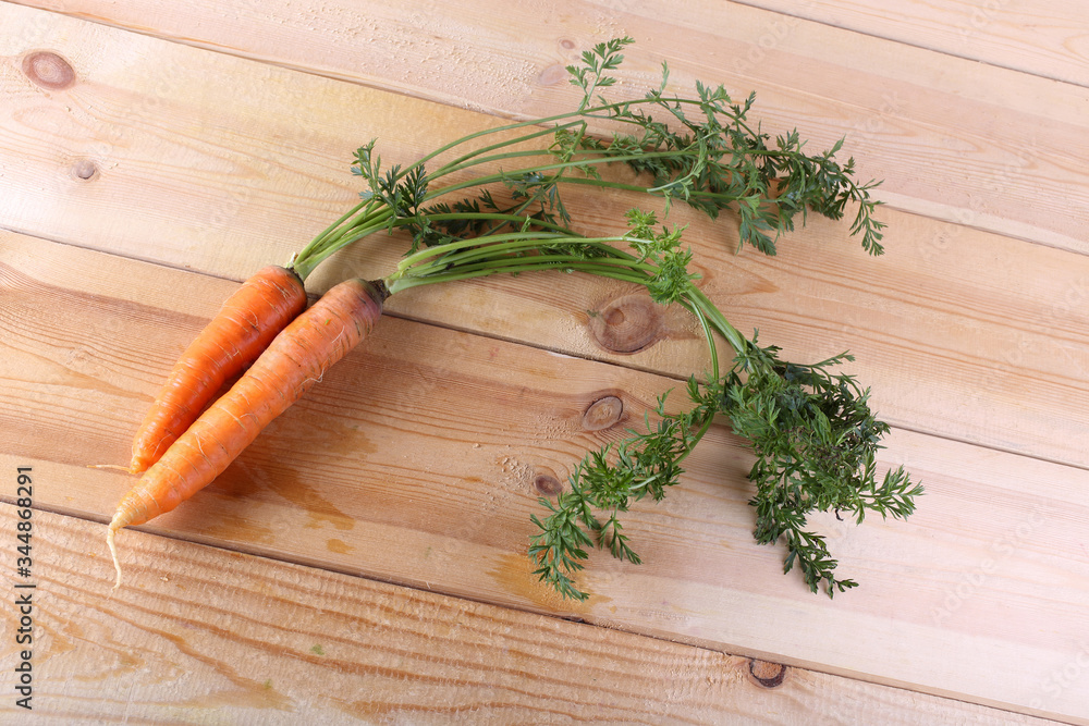 Carrots harvest on table Carrots harvest on table