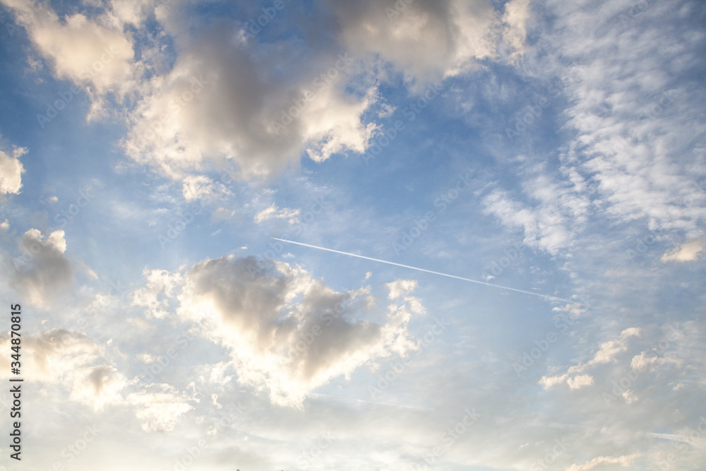 Cloudy sky and airplane track Cloudy sky and airplane track
