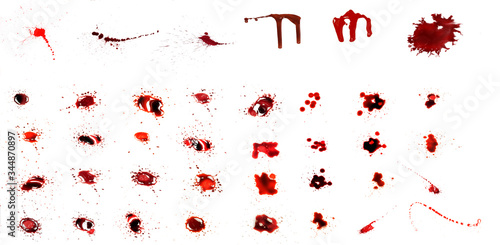 Blood dripping set.  Blood splatters. Drop and blob of blood. Bloodstains.   Red puddles isolated on white background