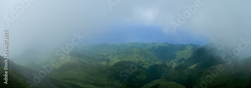 panoramic view on the vulcano on montagne pelée with clowd and  Martinique Sea photo