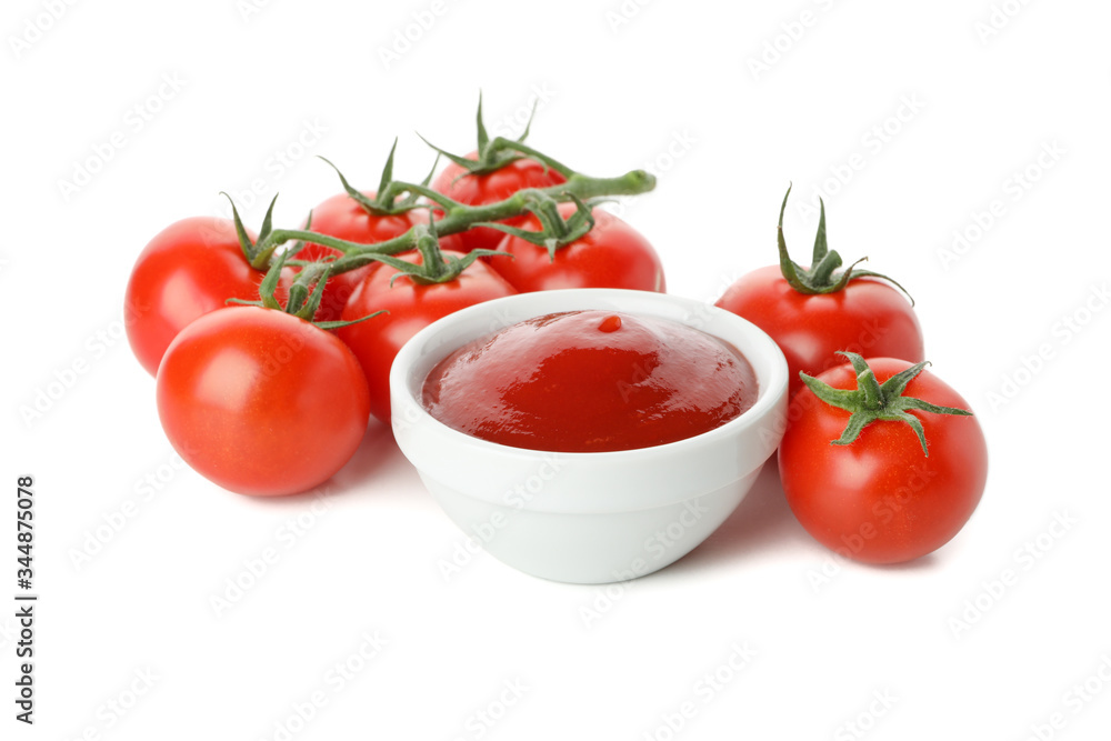 Branch of tomatoes and bowl with sauce isolated on white background Branch of tomatoes and bowl with sauce isolated on white background