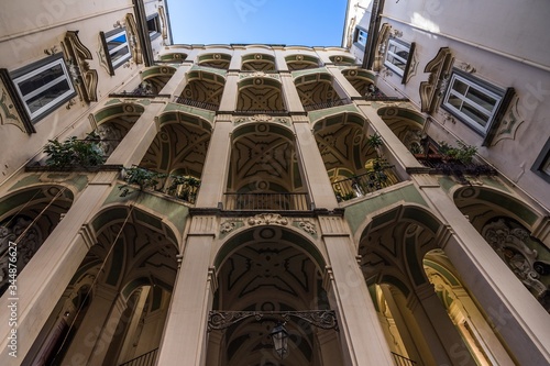 Low angle shot of Palazzo dello Spagnolo in Rione Sanita, Naples, Italy photo