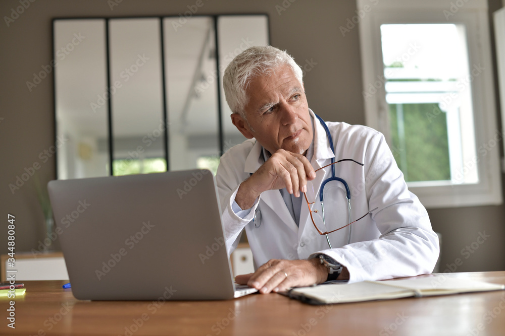 Portrait of doctor working in the office Portrait of doctor working in the office