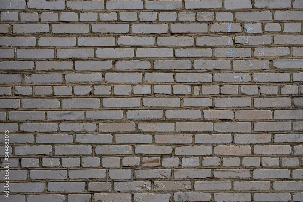 Fototapeta premium old white brick wall of the house