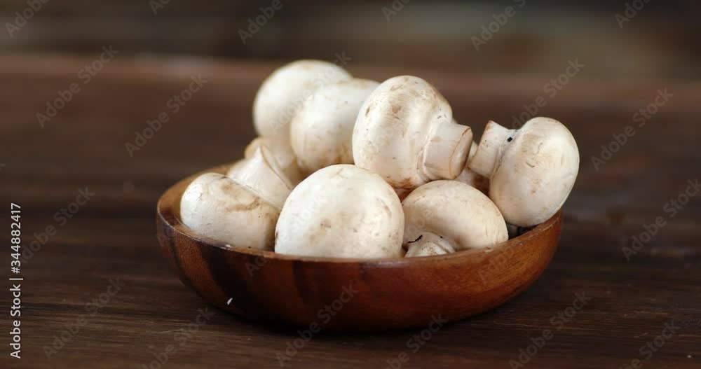 Fragrant mushrooms on a plate slowly rotate. Fragrant mushrooms on a plate slowly rotate.