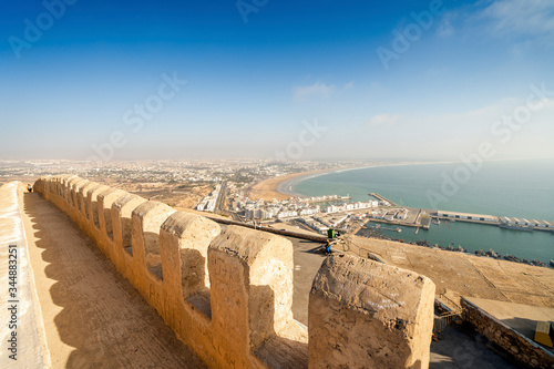 Modern Agadir with wide beach and port seen from old city walls on Oufella Hill, Morocco