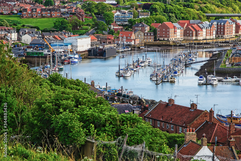 Ships in Whitby coastal line in North Yorkshire in England