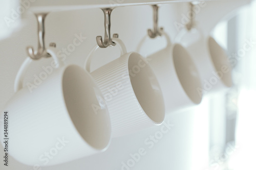 set of kitchen mugs on white background