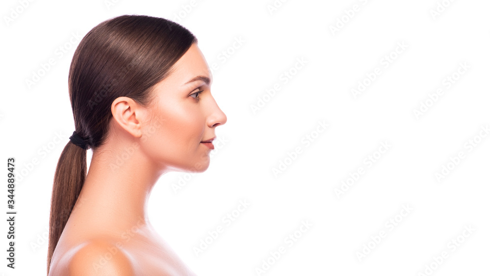 Cute smiling brunette adult with fresh clean skin on her face. Beauty headshot isolated on white. Cute smiling brunette adult with fresh clean skin on her face. Beauty headshot isolated on white.