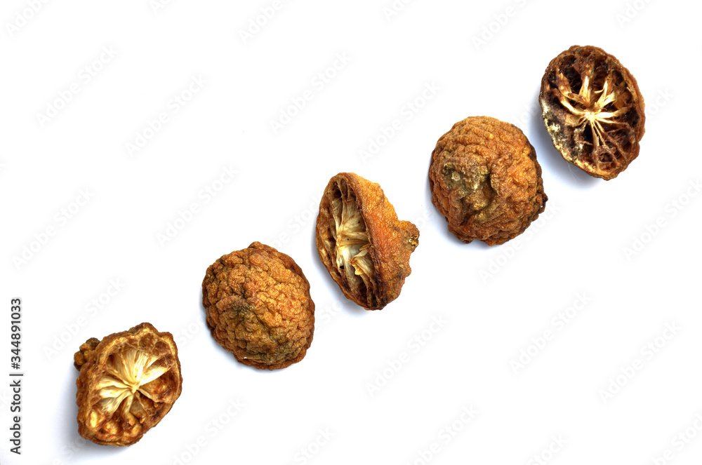 Rotten bergamot, It has brown color and dry peel that isolated on a white background. Rotten bergamot, It has brown color and dry peel that isolated on a white background.