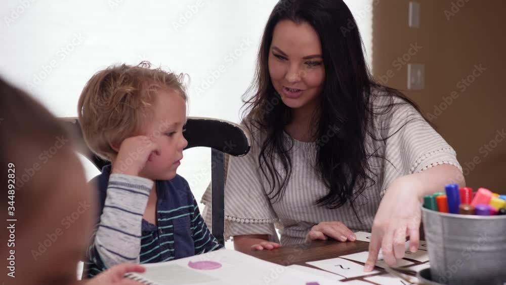 Mother Teaching Basic Counting To Her Little Son. Behind the shoulder video as kid learning counting with his mom. Mother Teaching Basic Counting To Her Little Son. Behind the shoulder video as kid learning counting with his mom.