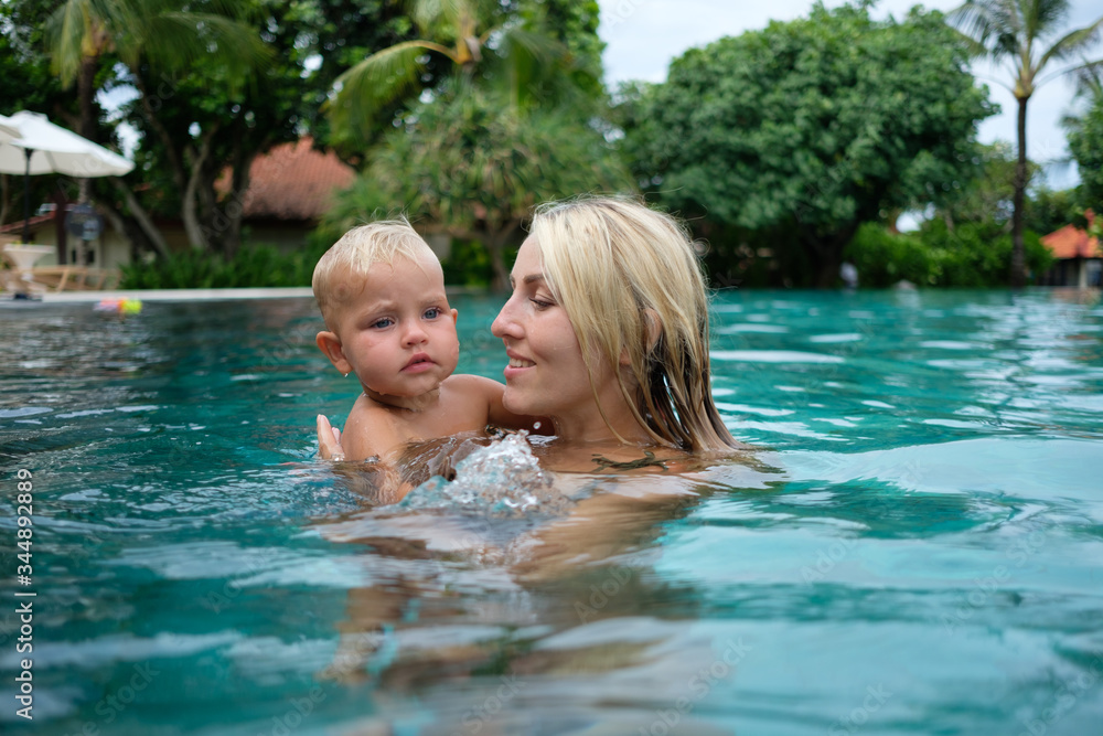 healthy family mother teaching baby swimming pool healthy family mother teaching baby swimming pool