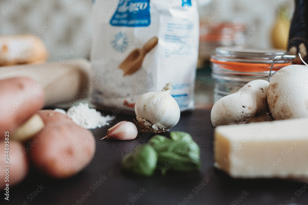 Fototapeta premium Italian ingredients for gnocchi and basil pesto 