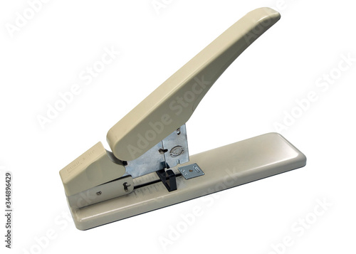 Big stapler stationary tooling used,old and dirty iin office on white background with clipping path