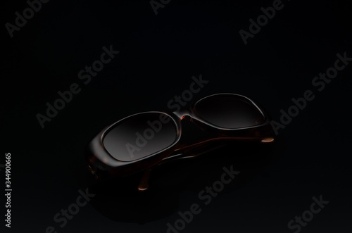 sunglasses are on a black background