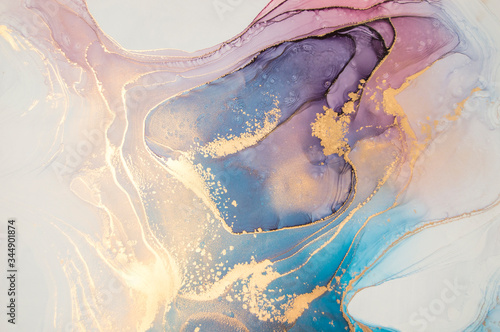 Luxury abstract fluid art painting in alcohol ink technique, mixture of blue and purple paints.  Imitation of marble stone cut, glowing golden veins. Tender and dreamy design. 