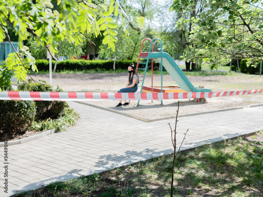 The Playground is fenced with a red ribbon as a result of quarantine to prevent the spread of the pandemic coronavirus. The Playground is fenced with a red ribbon as a result of quarantine to prevent the spread of the pandemic coronavirus.
