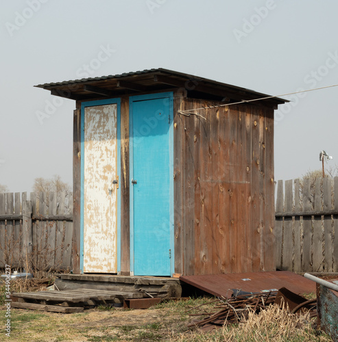 Small wooden toilet in the countryside. Wooden toilet

