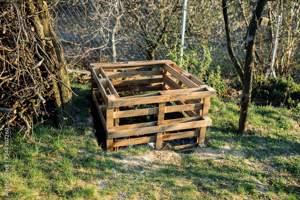 Pallet Compost Bin. Composter made of pallets in garden Pallet Compost Bin. Composter made of pallets in garden