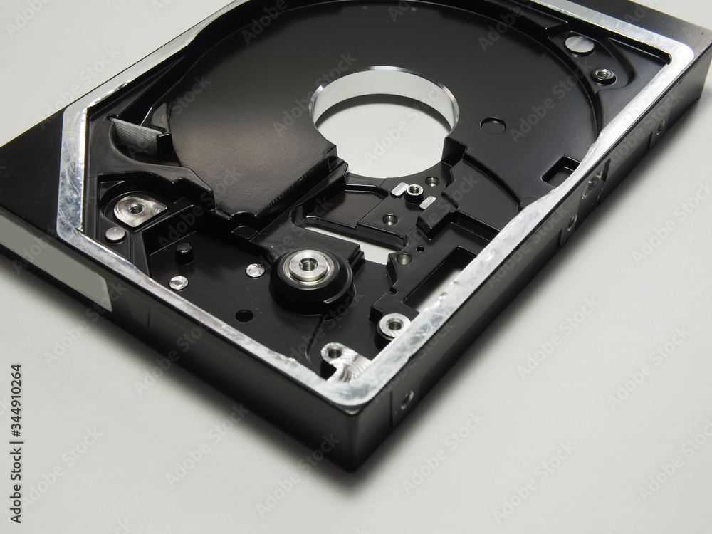 Hard drive, electronic and mechanical parts close-up. Components of electronic devices, macro photos. Hard drive, electronic and mechanical parts close-up. Components of electronic devices, macro photos.