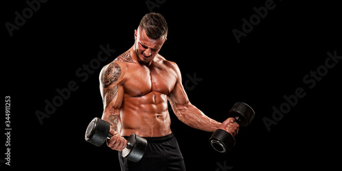 Handsome Muscular Men Exercise With Weights  Lifting Weights. Copy Space