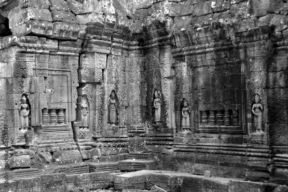 Temple adorned with female sculptures in the Angkor Wat complex, Cambodia Temple adorned with female sculptures in the Angkor Wat complex, Cambodia