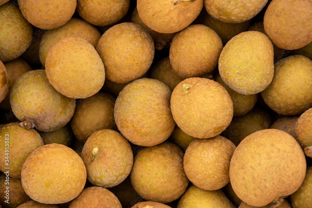 Longan fruit top view background. Longan fruit top view background.