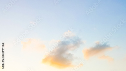 Beautiful cloudscape orange clouds on blue sky from sunlight in sunset time with space background.