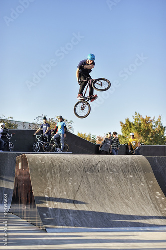 High jump on a bmx bike in a skatepark