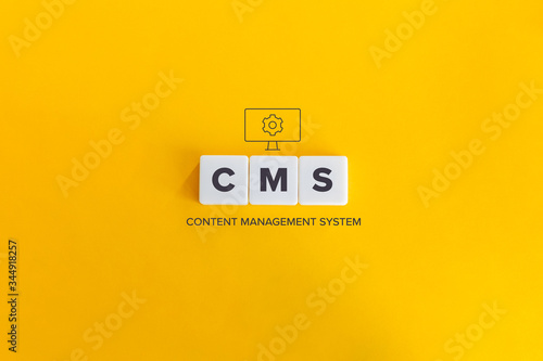 CMS (Content Management System) banner and concept. Block letters on bright orange background. Minimal aesthetics. photo