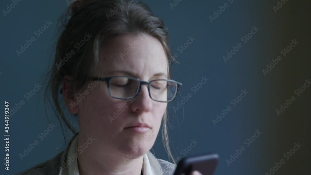 Woman works from home and takes phone call_Close Woman works from home and takes phone call_Close