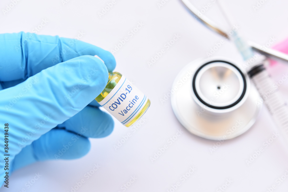 Fototapeta premium Vial of COVID-19 virus vaccine for injection, protective from novel coronavirus 2019 found in Wuhan, China