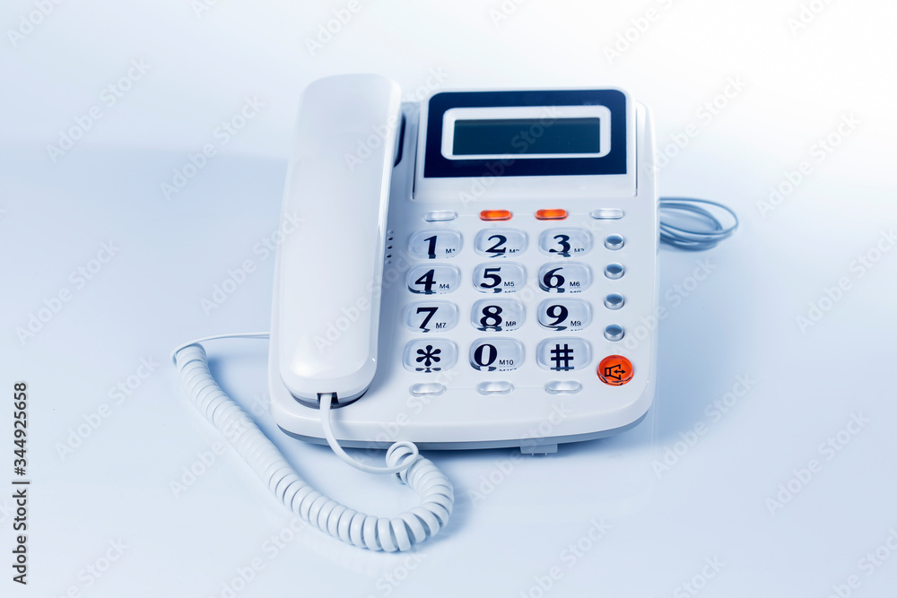 A grey telephone A grey telephone