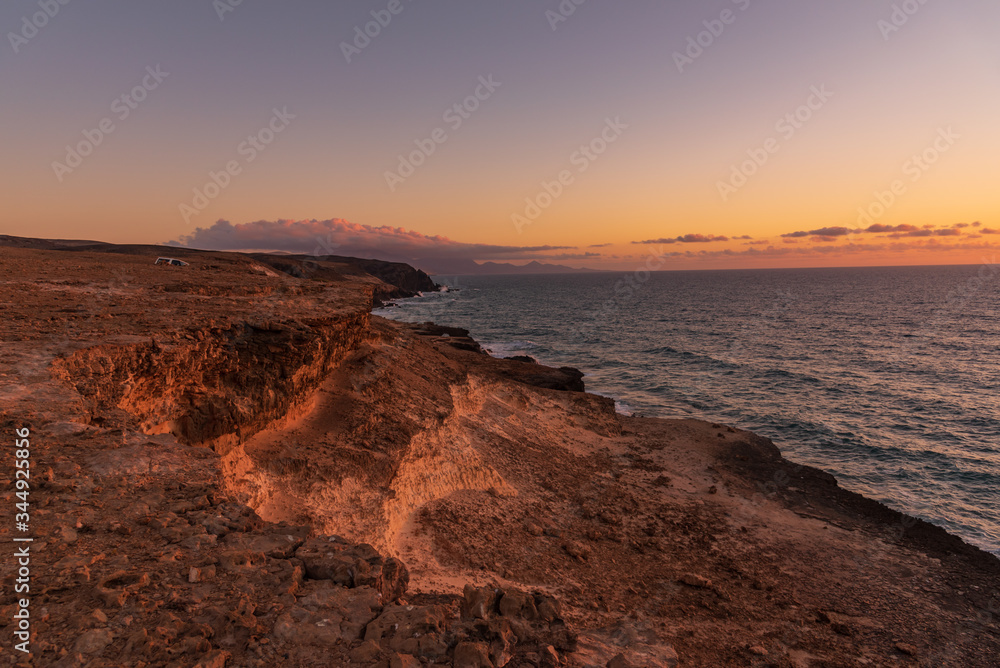caves and cliffs of Fuerteventura in Spain at sunset