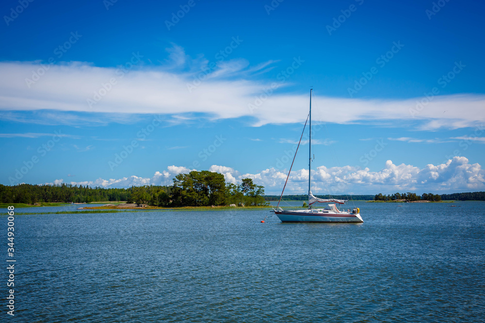 Yacht on the lake on a sunny summer day Yacht on the lake on a sunny summer day