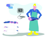 Male fishmonger wearing an apron with large fish taking them out of the boxes to be weighed