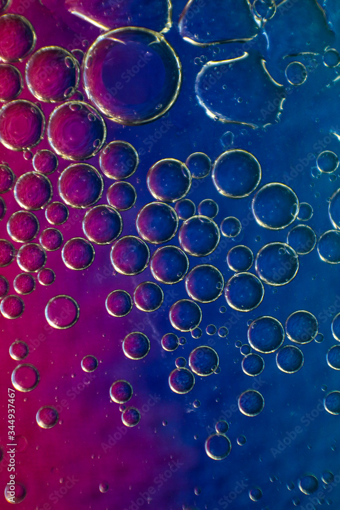 oil bubbles on a blue-pink background