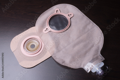 Urostomy pouch and wafer which works with a stoma for urine evacuation photo
