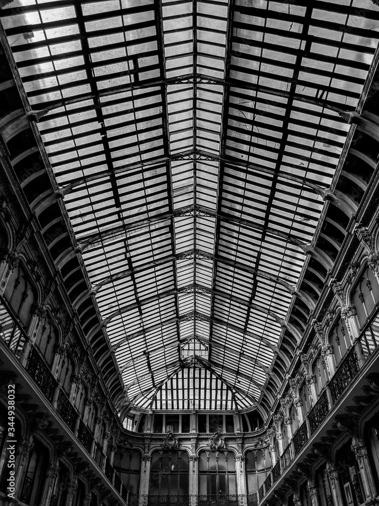 Turin, Italy, 16 August 2018: Black and White Photography of the ceiling of the historical building gallery subalpina in Turin, Italy