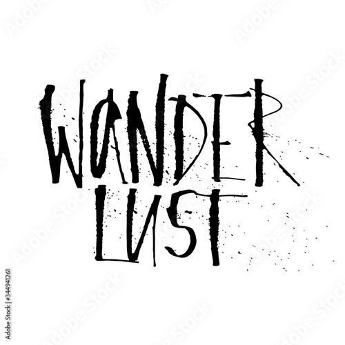 Hand drawn wanderlust word. Expressive Calligraphy with splashes.Ink and ruling pen nib. Lettering Wanderlust lettering isolated on white. Concept art for travelers, tourists, holiday camps photo
