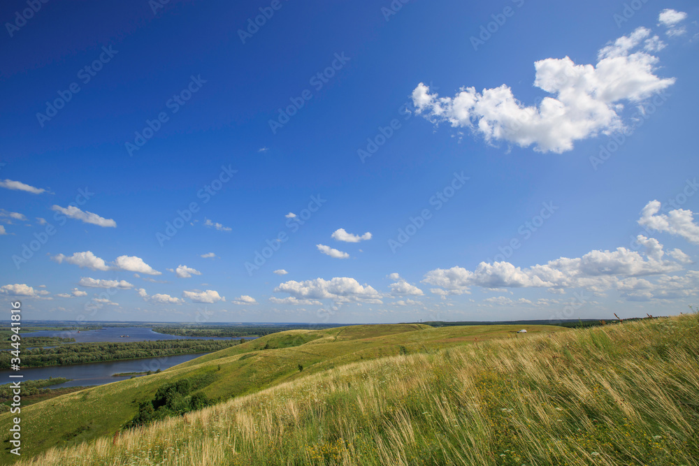 beautiful hills on the high bank of the river Vyatka on a sunny day in summer beautiful hills on the high bank of the river Vyatka on a sunny day in summer