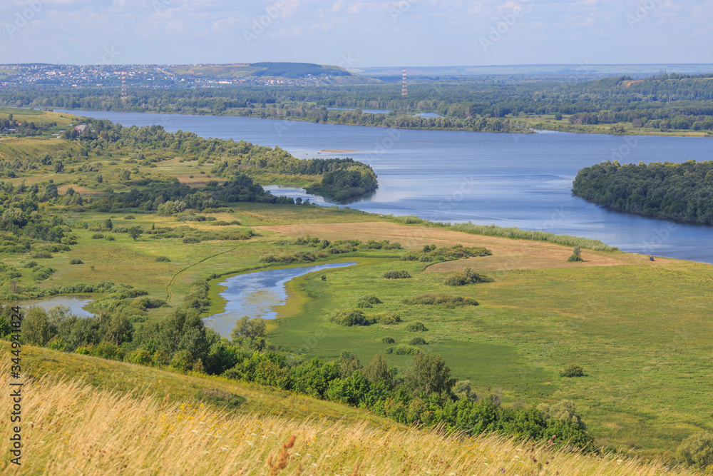 view of the valley of the river Vyatka and flood meadows from the high bank