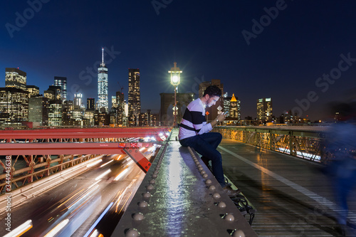 Photography New York City - sunset over Manhattan from Brooklyn Bridge.