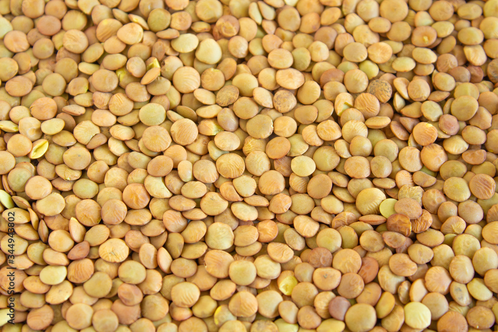 Yellow lentils, legumes, lentils, lentils. Close-up. Only croup in the frame. Yellow lentils, legumes, lentils, lentils. Close-up. Only croup in the frame.