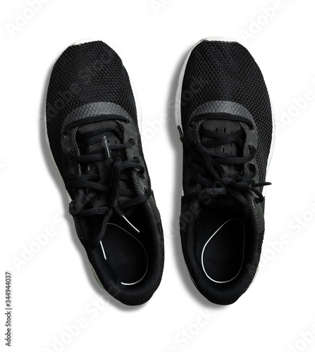 Black sport shoes on white background,top view