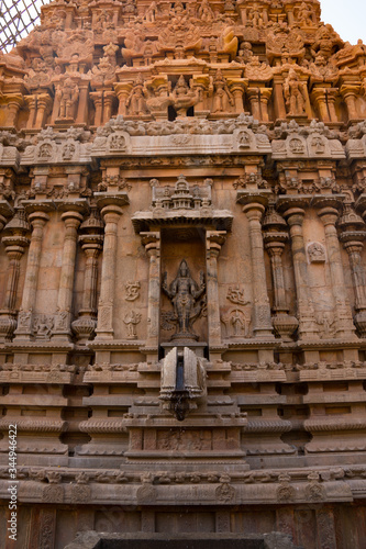 A beautiful picture of a Hindu idol in the wall of a temple in India