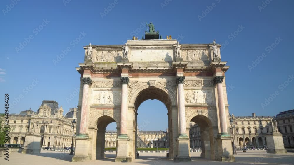 The Arc de Triomphe du Carrousel delineating the Louvre Palace from the Tuileries gardens The Arc de Triomphe du Carrousel delineating the Louvre Palace from the Tuileries gardens
