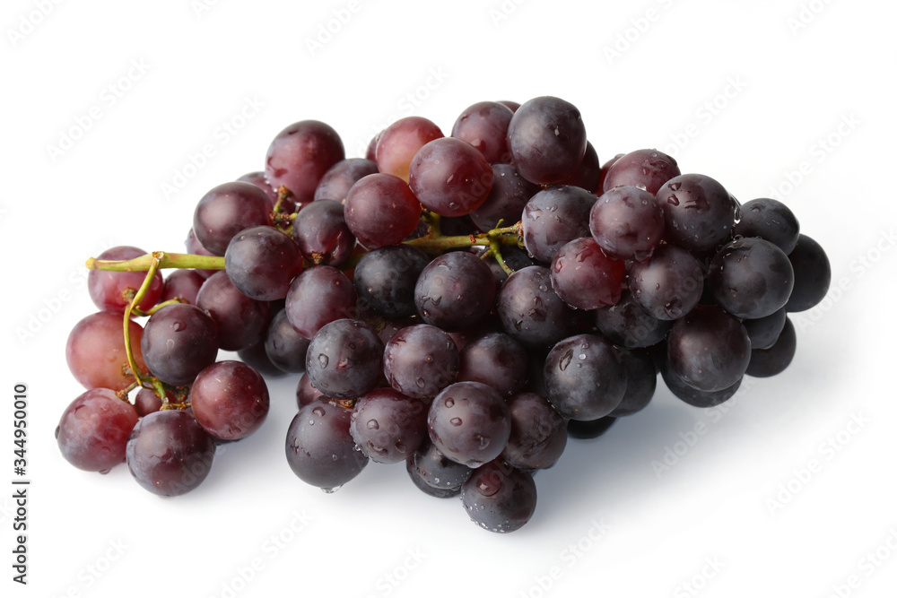 A branch of dark grapes on a white background A branch of dark grapes on a white background